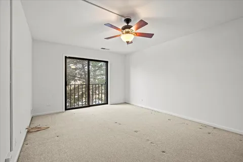 a spacious bathroom with a double vanity sink mirror and double