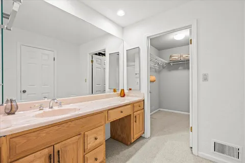 a bathroom with a shower and a toilet