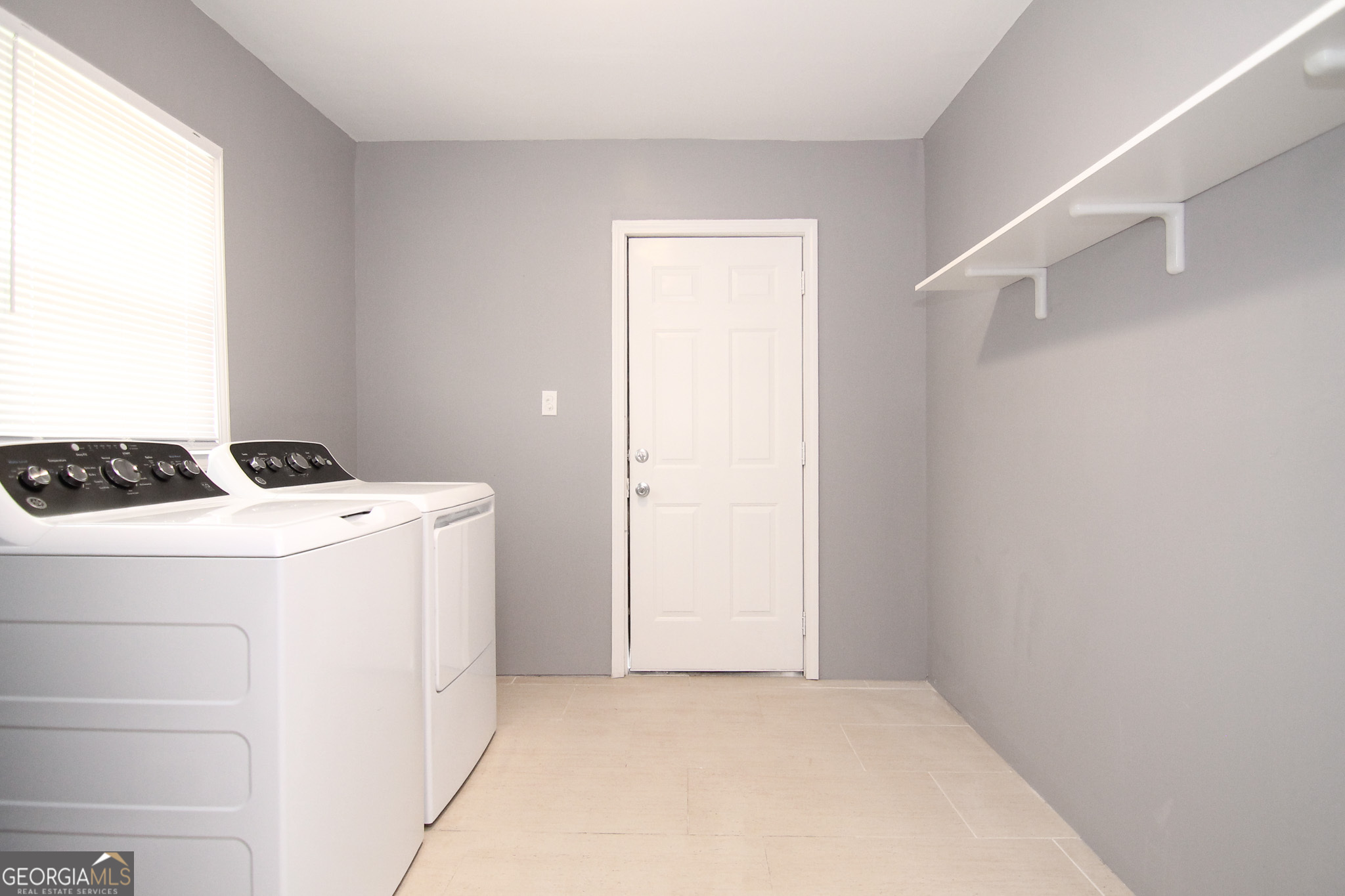 708 South 3rd Street Warner Robins, GA 31088 - Photo 12 of 29 a utility room with dryer and washer
