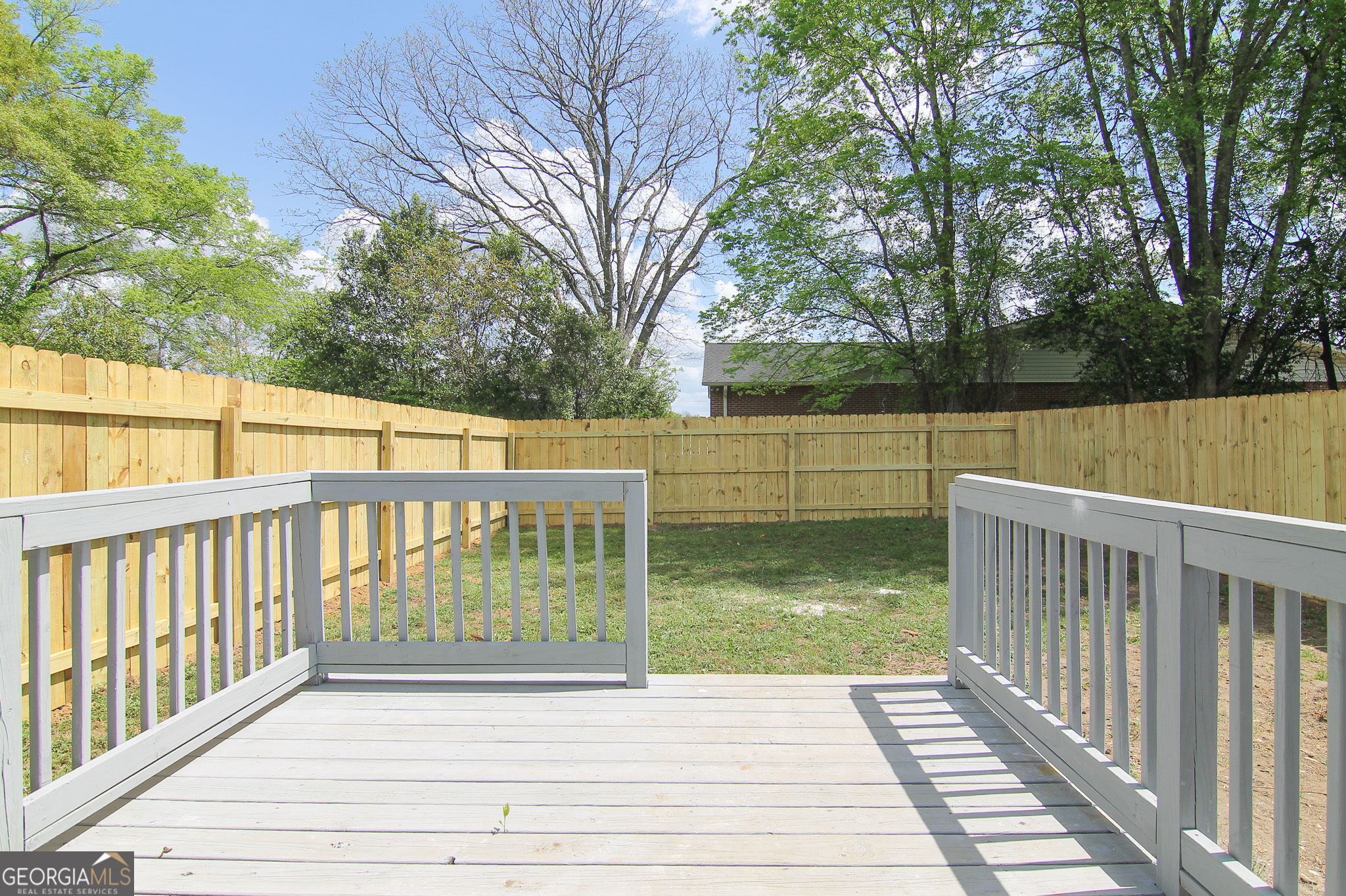 708 South 3rd Street Warner Robins, GA 31088 - Photo 14 of 29 a view of a balcony with wooden floor