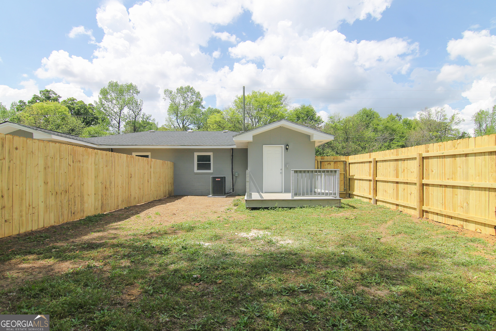 708 South 3rd Street Warner Robins, GA 31088 - Photo 15 of 29 a house with trees in the background