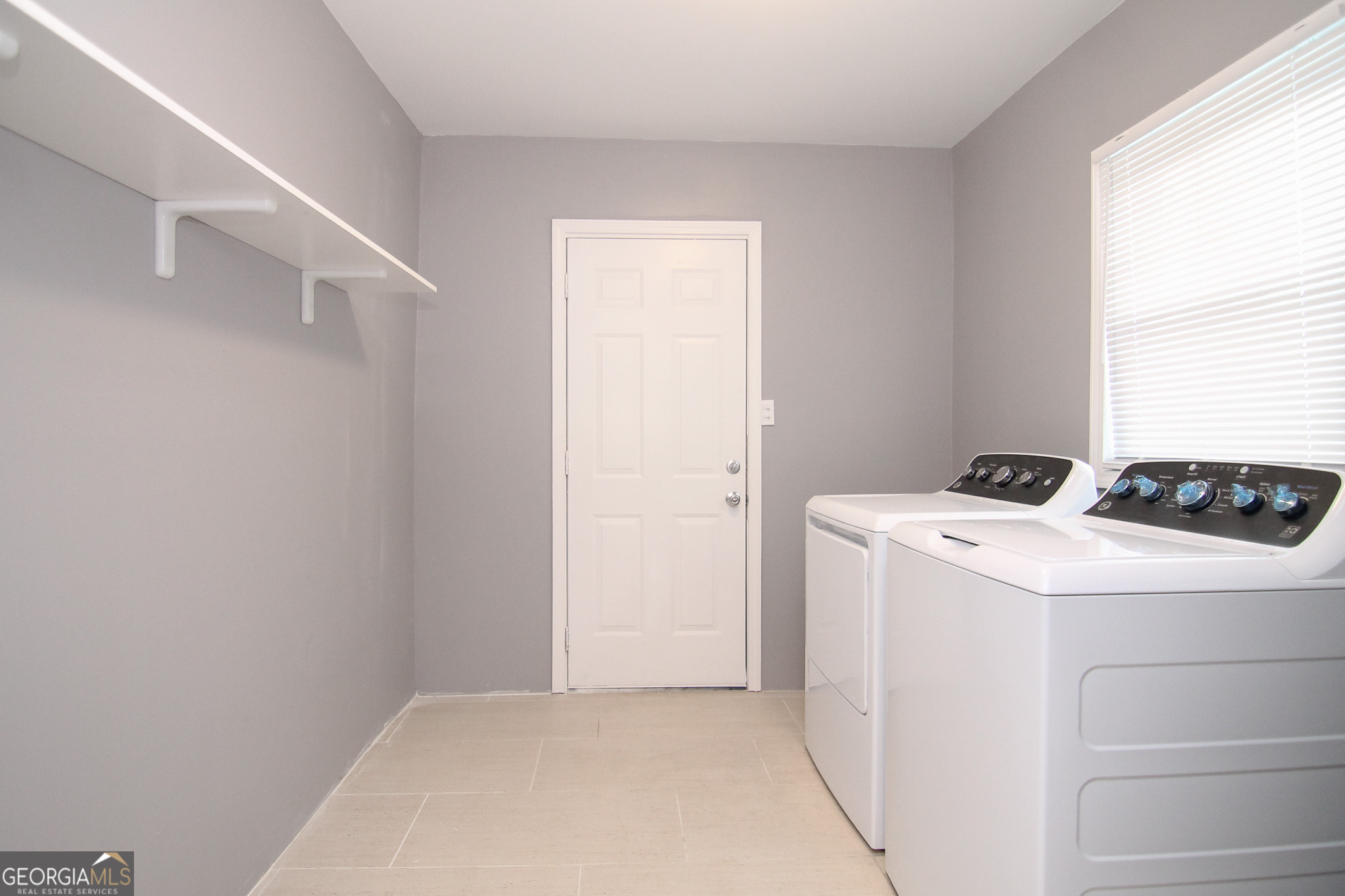 708 South 3rd Street Warner Robins, GA 31088 - Photo 26 of 29 a utility room with dryer and washer