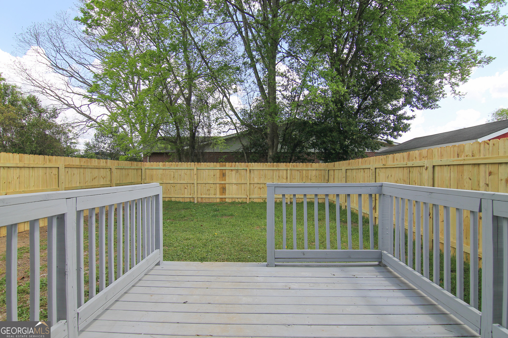 708 South 3rd Street Warner Robins, GA 31088 - Photo 29 of 29 a view of deck with a backyard
