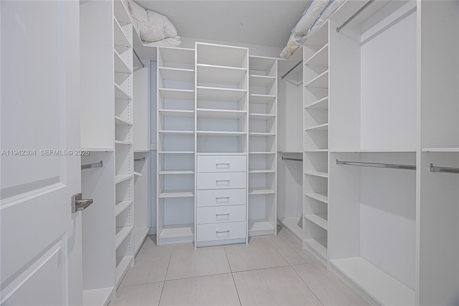 7214 Rockwood Road Jupiter, FL 33458 - Photo 24 of 28 a view of an empty walk in closet