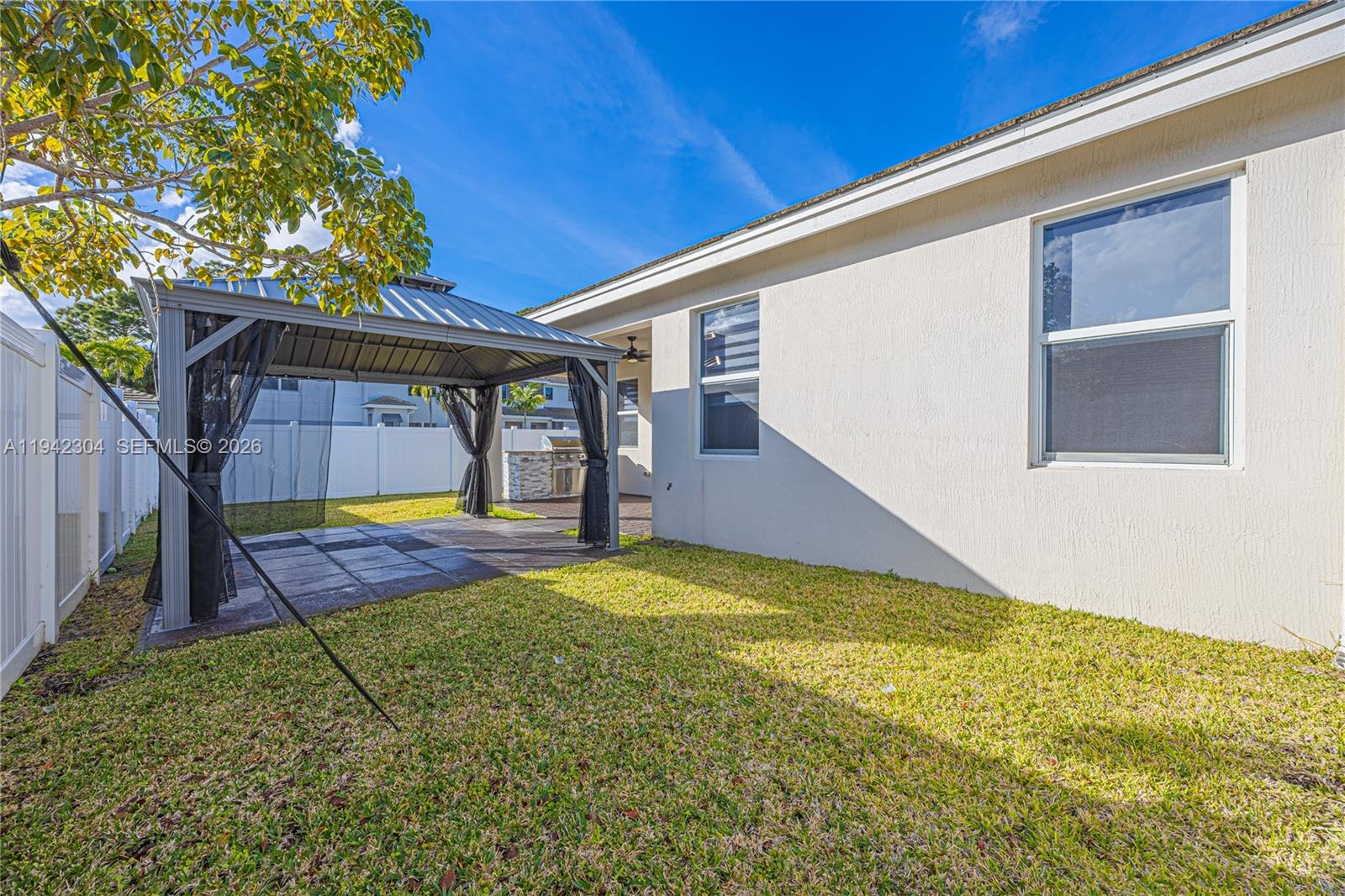 7214 Rockwood Road Jupiter, FL 33458 - Photo 27 of 28 a view of swimming pool with small yard