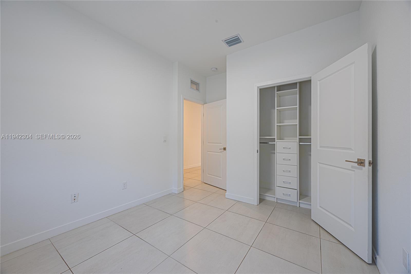 7214 Rockwood Road Jupiter, FL 33458 - Photo 5 of 28 a view of an empty room