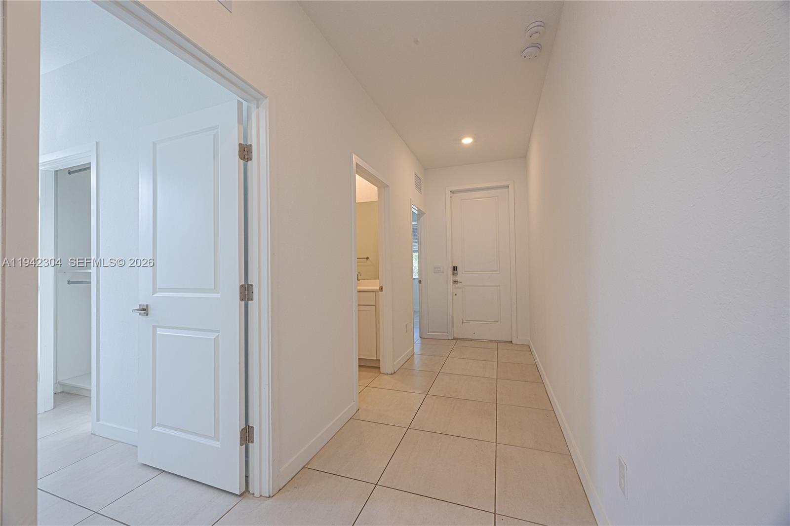 7214 Rockwood Road Jupiter, FL 33458 - Photo 9 of 28 a bathroom with a sink and a mirror