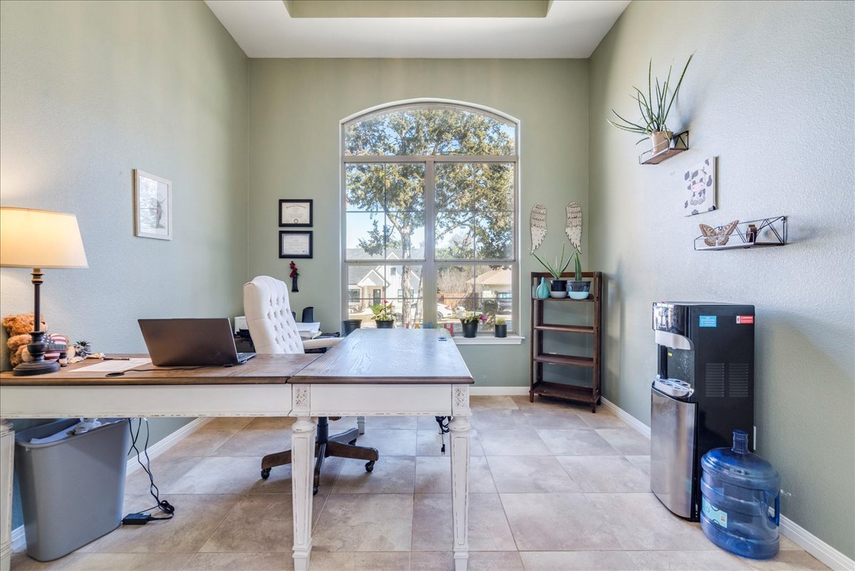 11 Rhapsody Lane Wimberley, TX 78676 - Photo 16 of 35 a room with furniture and a large window
