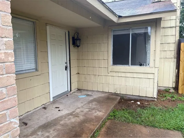 a front view of a house with a garage