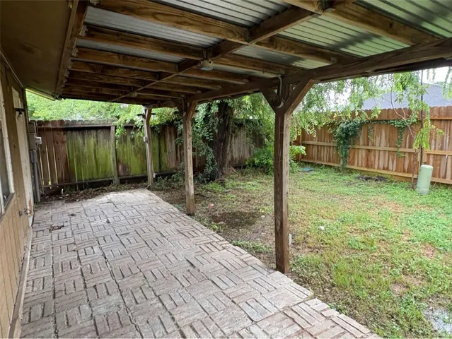 a view of backyard with green space