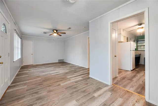 a view of a livingroom with wooden floor