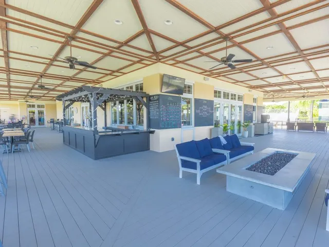 a view of a porch with seating space