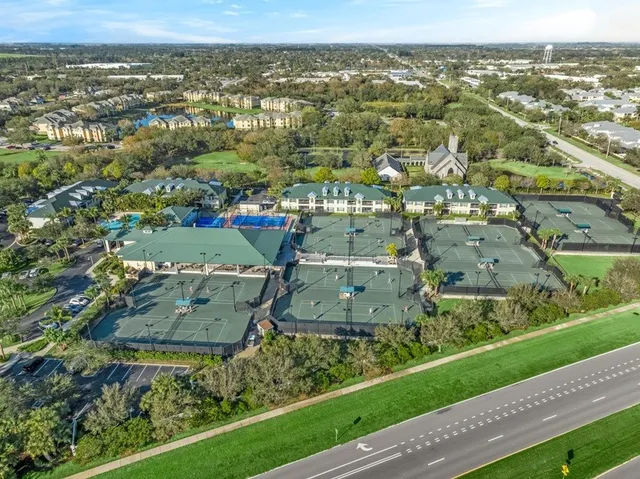 a aerial view of a yard with a lake view
