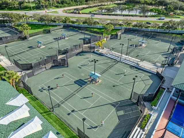 a view of a backyard with sitting area