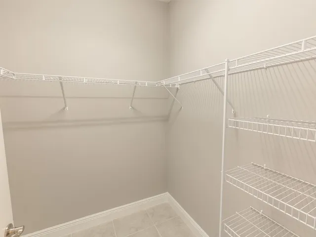 a view of a room with racks on the wall