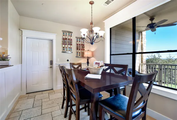 a view of a dining room with furniture