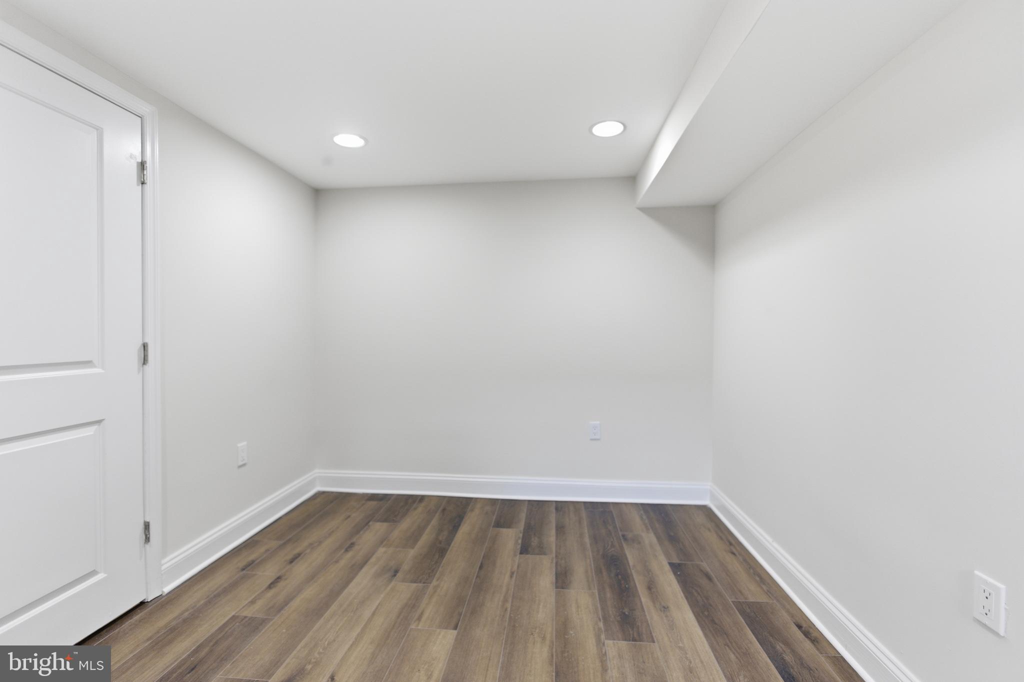 10 Girard Street Northeast Washington, DC 20002 - Photo 17 of 31 a view of a room with wooden floor