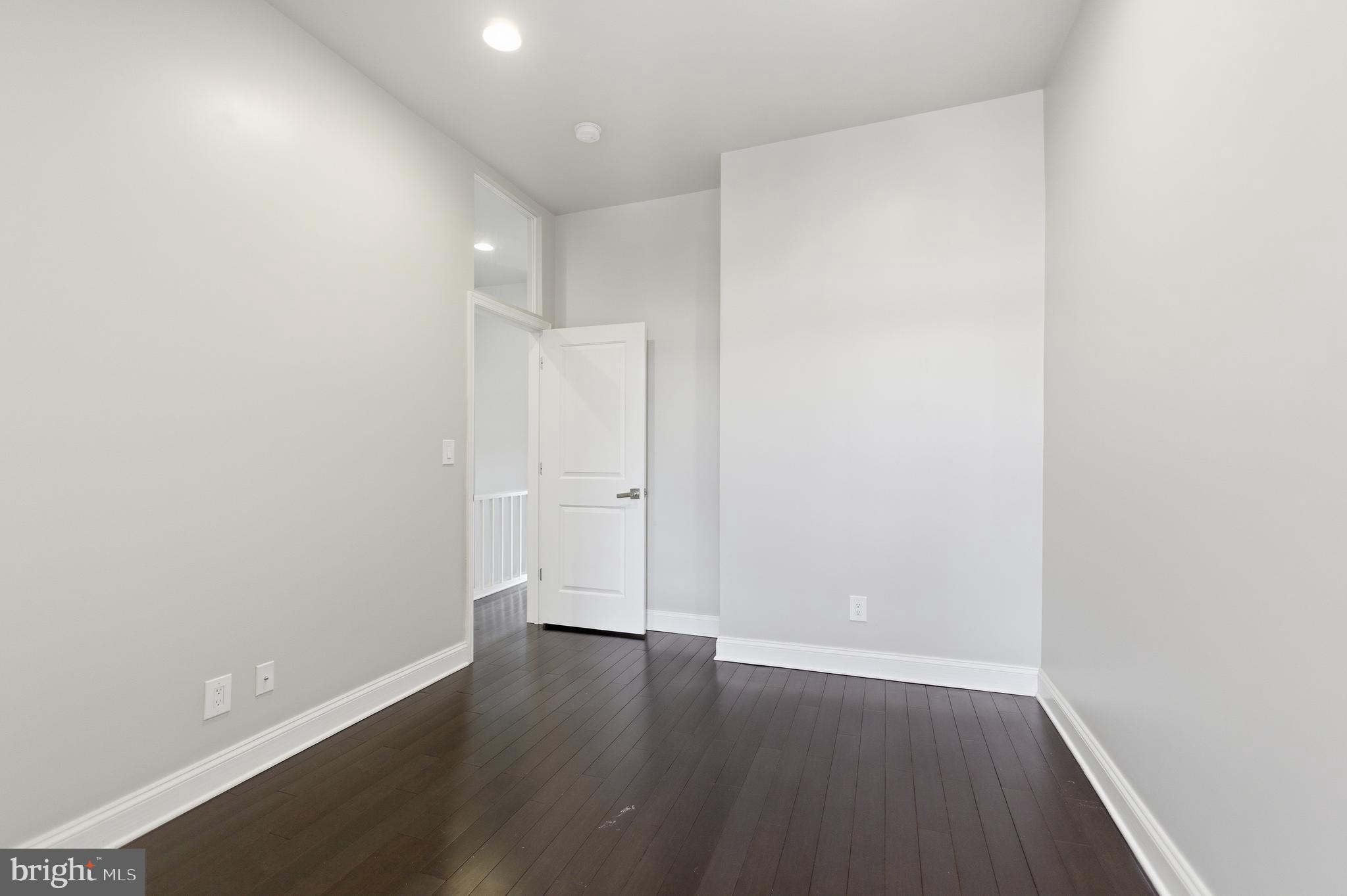 10 Girard Street Northeast Washington, DC 20002 - Photo 25 of 31 a view of wooden floor in an empty room