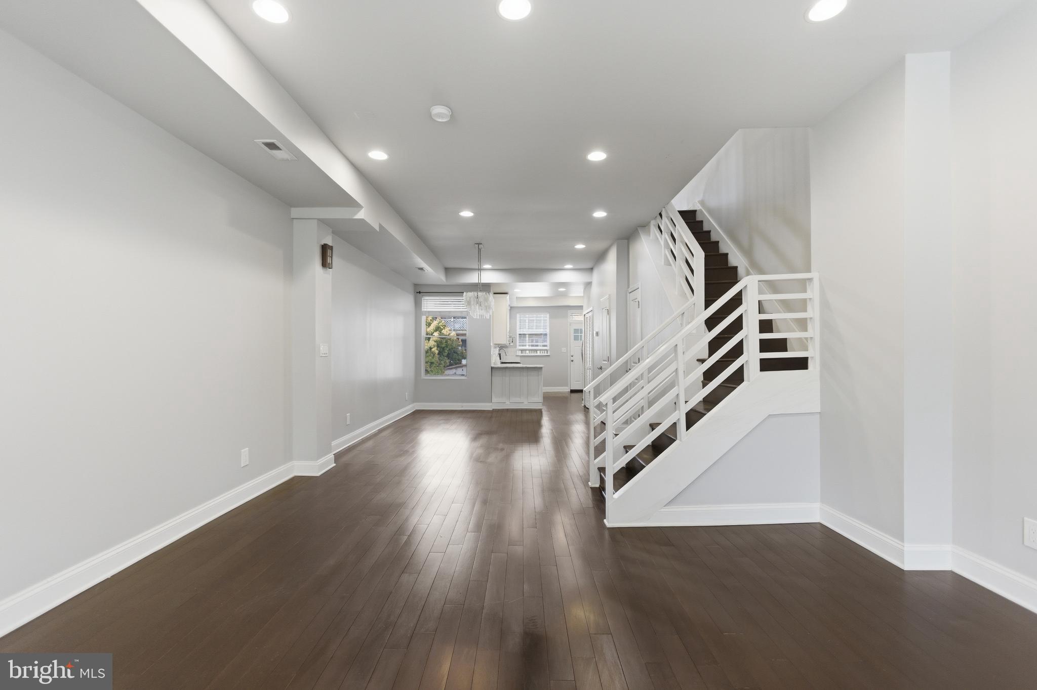 10 Girard Street Northeast Washington, DC 20002 - Photo 3 of 31 a view of entryway and hall with wooden floor