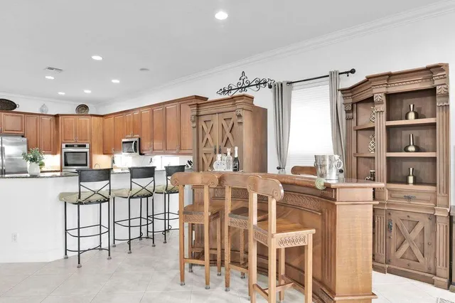 $11,000 | 10703 Versailles Boulevard, Wellington, FL 33449