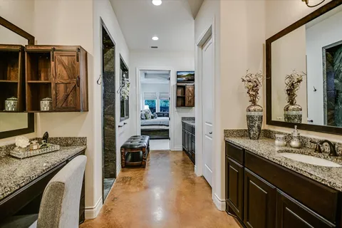 a kitchen with granite countertop lots of counter top space and stainless steel appliances