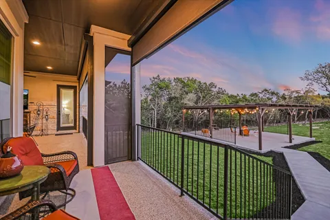 a view of a house with a big yard