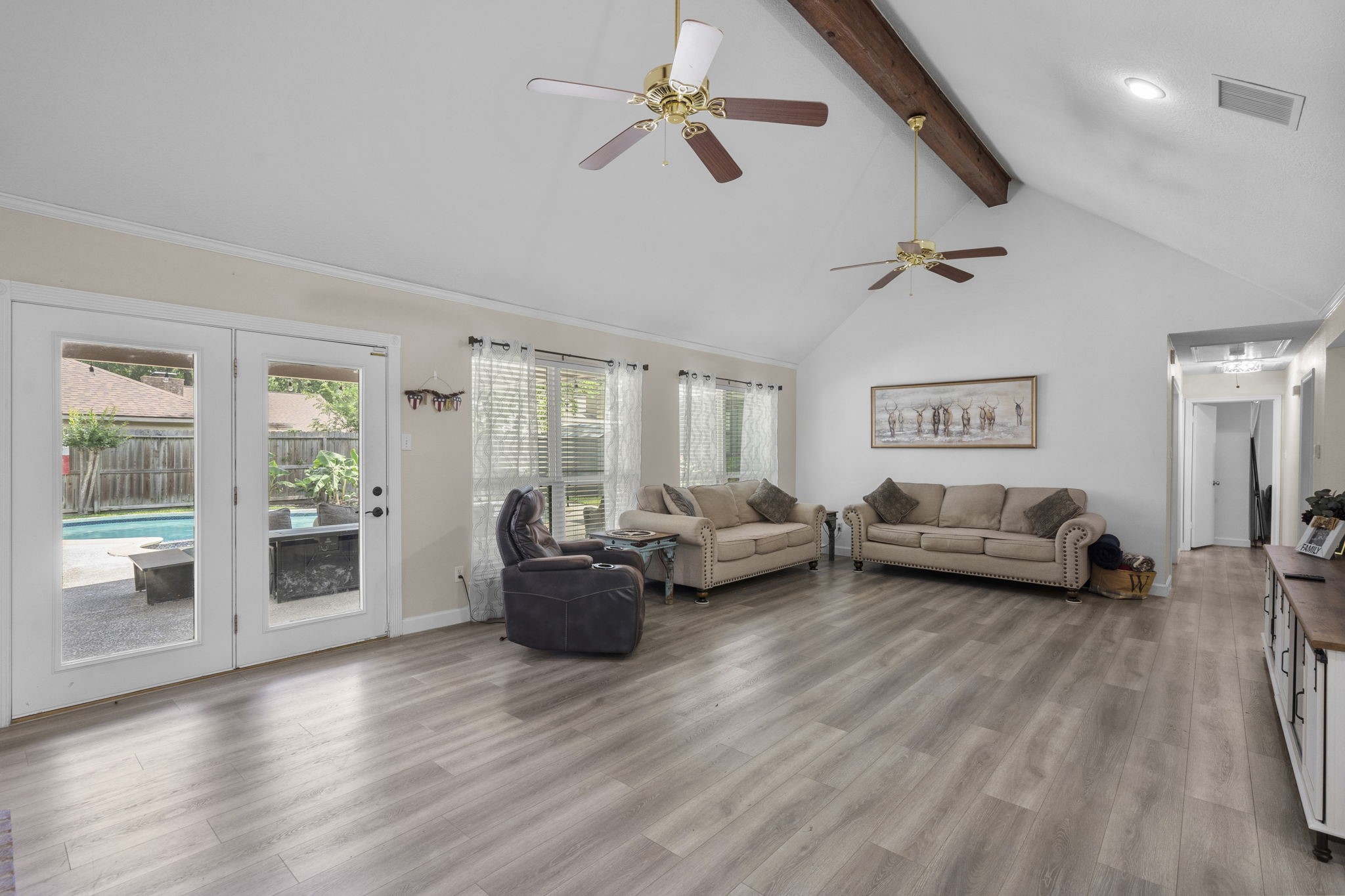 19602 Dianeshire Drive Spring, TX 77388 - Photo 11 of 37 a living room with furniture and a wooden floor