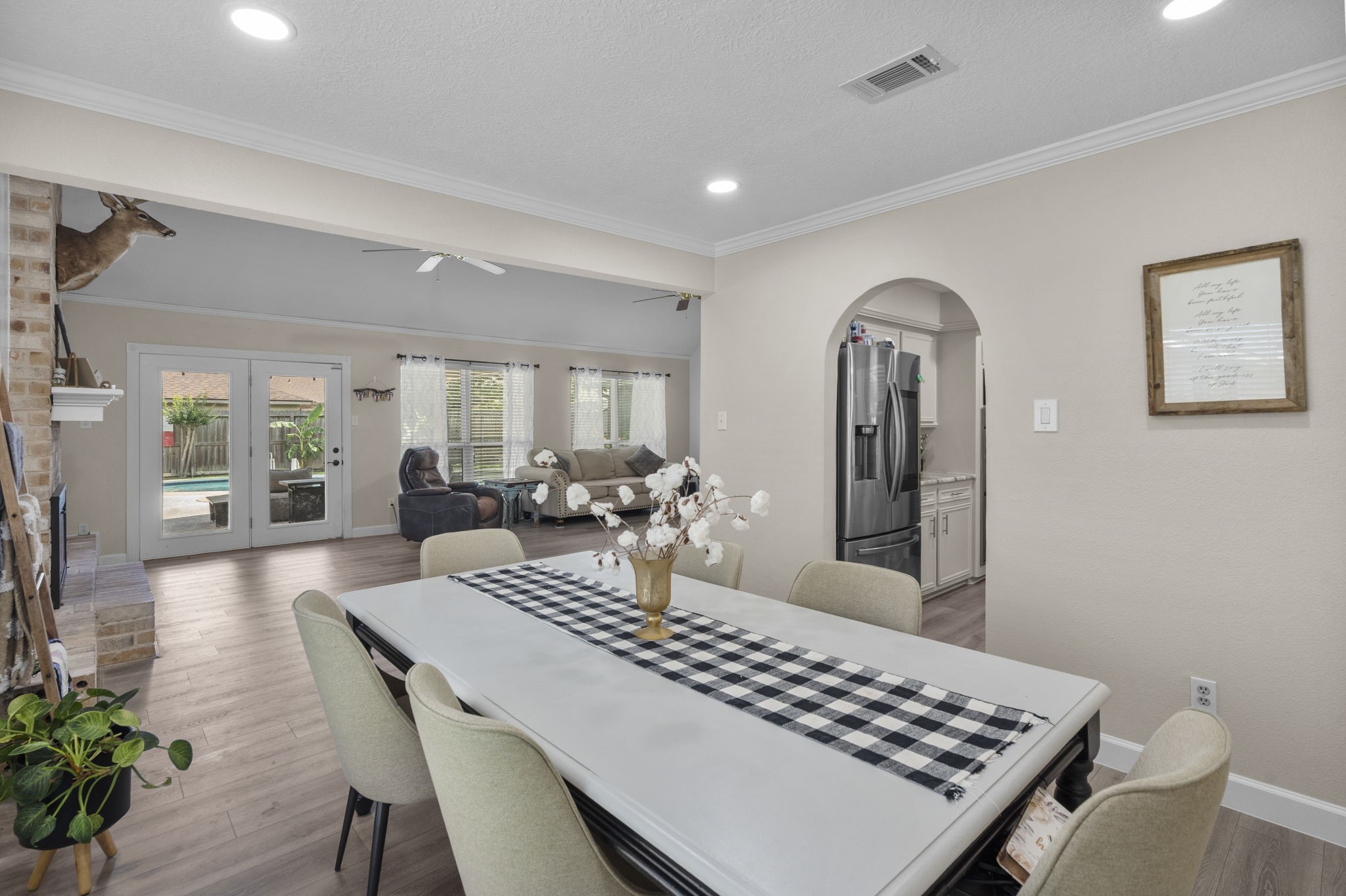 19602 Dianeshire Drive Spring, TX 77388 - Photo 13 of 37 Bright and open dining area leading into the expansive living room.