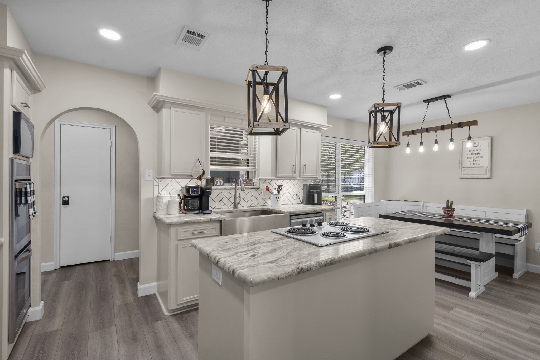 19602 Dianeshire Drive Spring, TX 77388 - Photo 14 of 37 a kitchen with granite countertop a sink a counter space appliances and cabinets