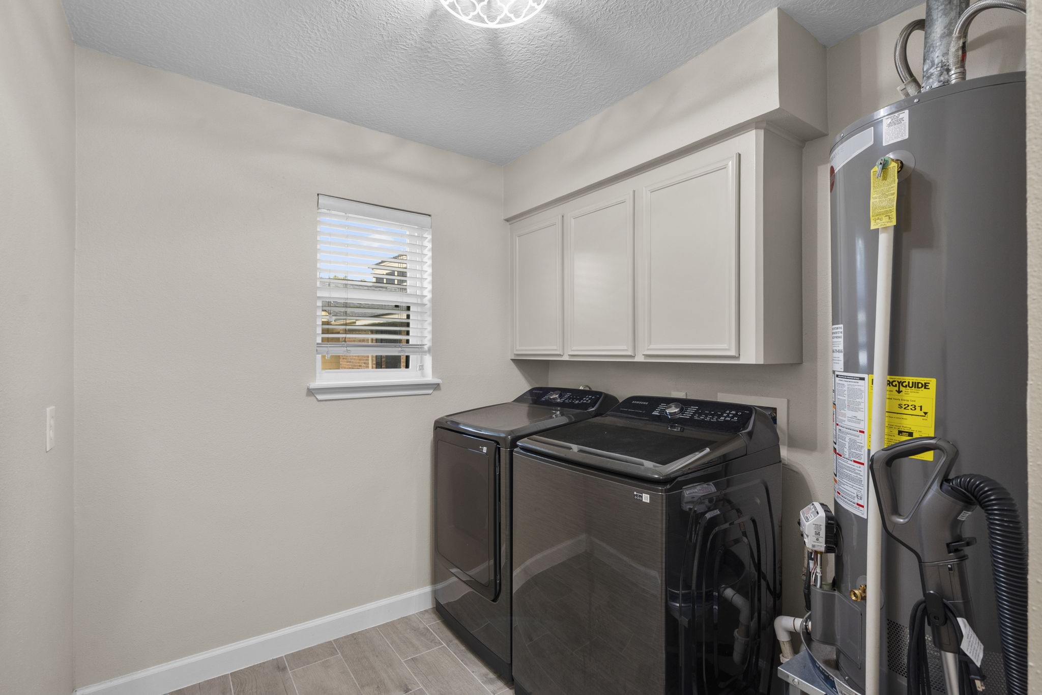 19602 Dianeshire Drive Spring, TX 77388 - Photo 21 of 37 a kitchen with stainless steel appliances granite countertop a stove and a refrigerator