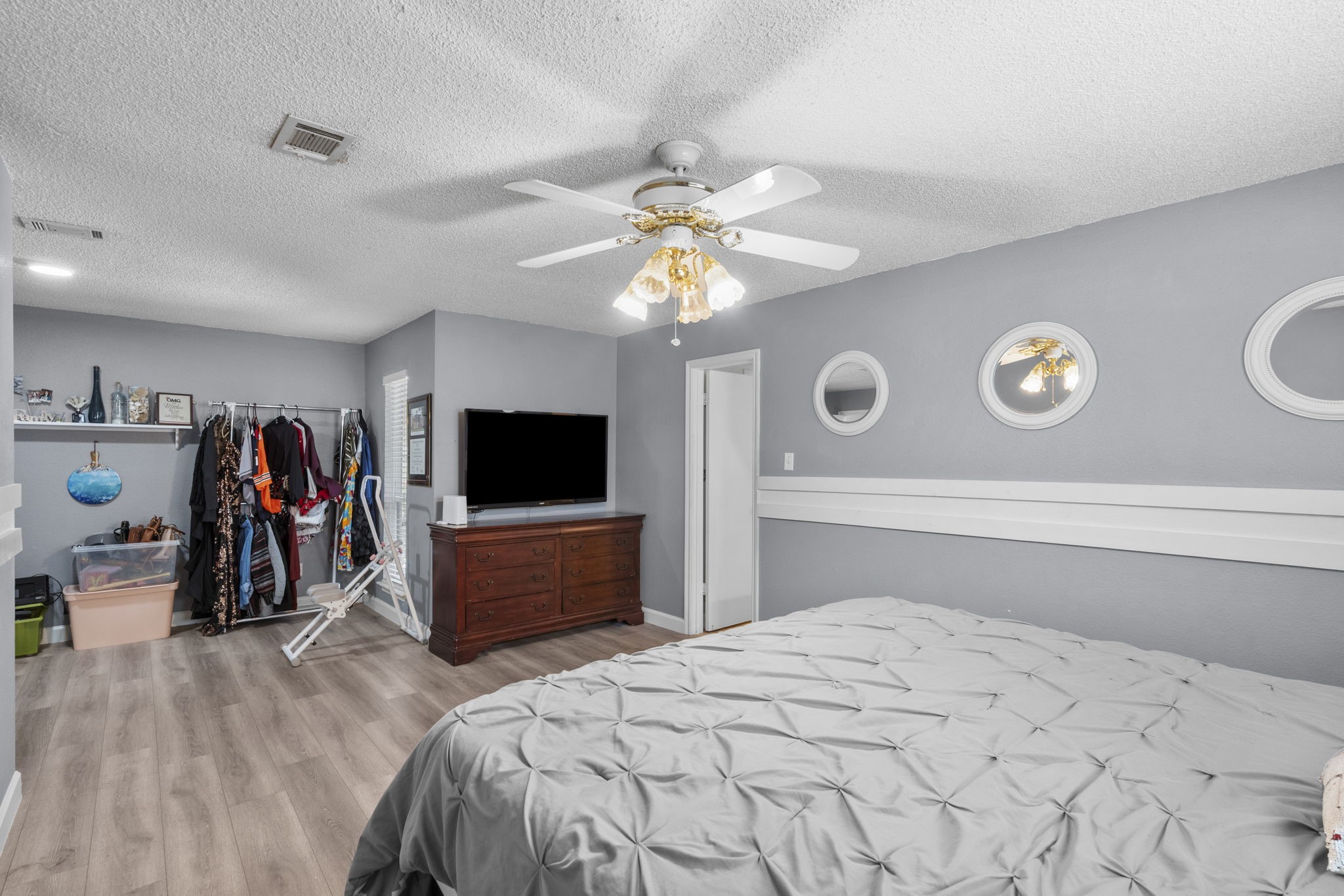 19602 Dianeshire Drive Spring, TX 77388 - Photo 24 of 37 a bedroom with a bed and a ceiling fan