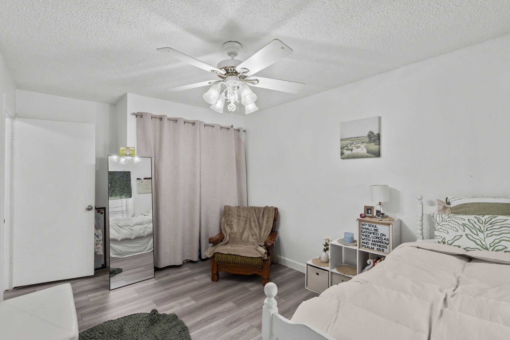 19602 Dianeshire Drive Spring, TX 77388 - Photo 33 of 37 a living room with furniture and wooden floor