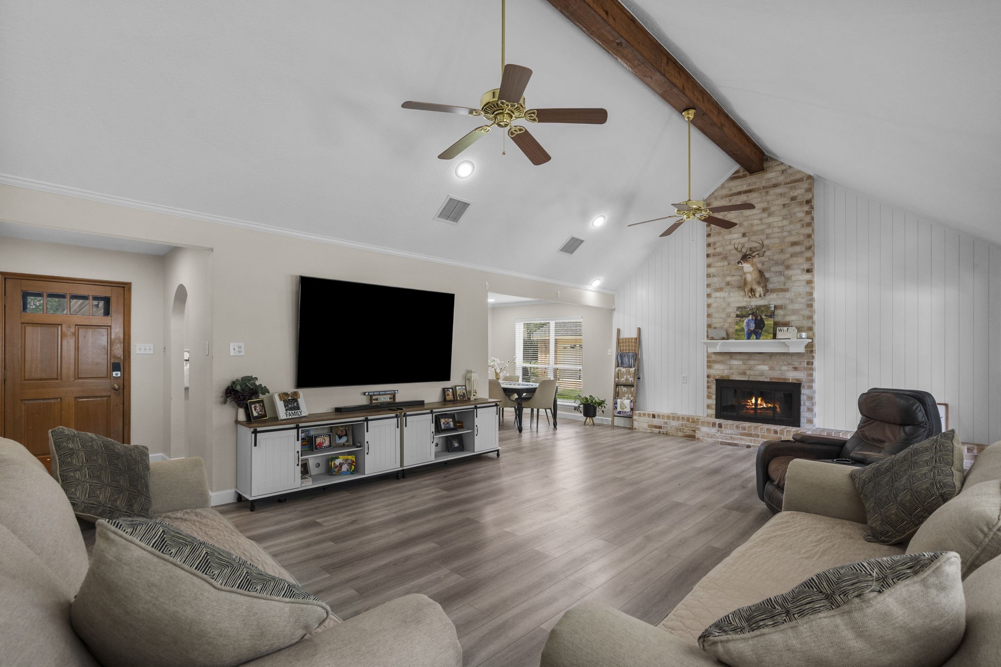 19602 Dianeshire Drive Spring, TX 77388 - Photo 10 of 37 a living room with furniture and a flat screen tv