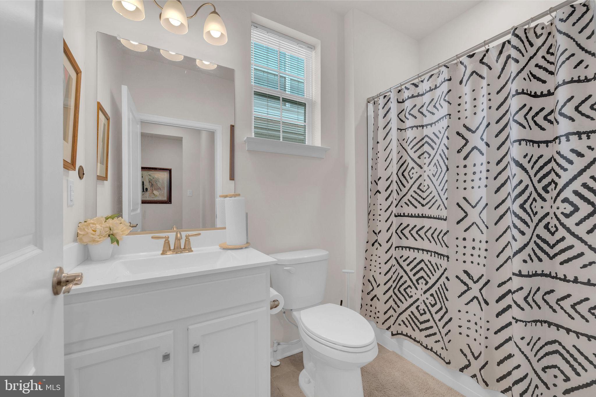 31 Walton Way Delanco, NJ 08075 - Photo 20 of 30 a bathroom with a sink and mirror with toilet