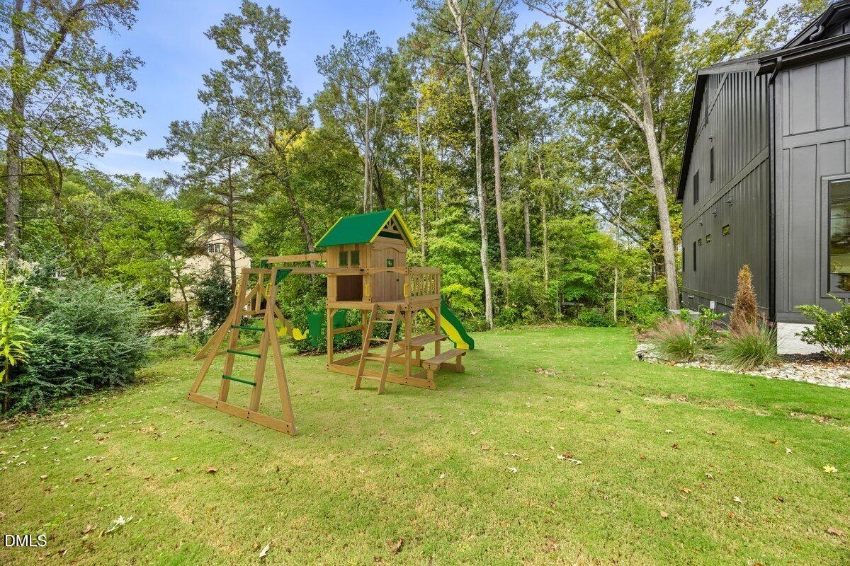 5406 Garrett Road Durham, NC 27707 - Photo 62 of 80 side yard- virtually staged to show opportunities