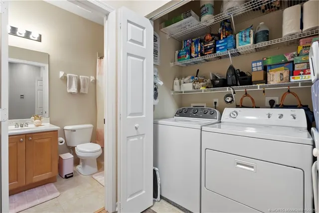 a storage room with washer and dryer