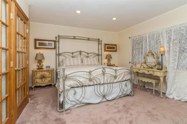 a bathroom with a granite countertop sink mirror and shower