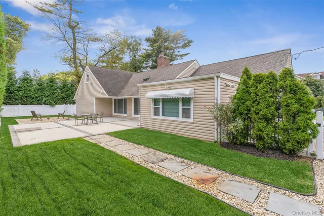 a house view with a garden space