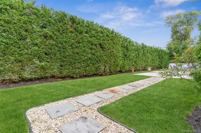 a view of a backyard with a garden