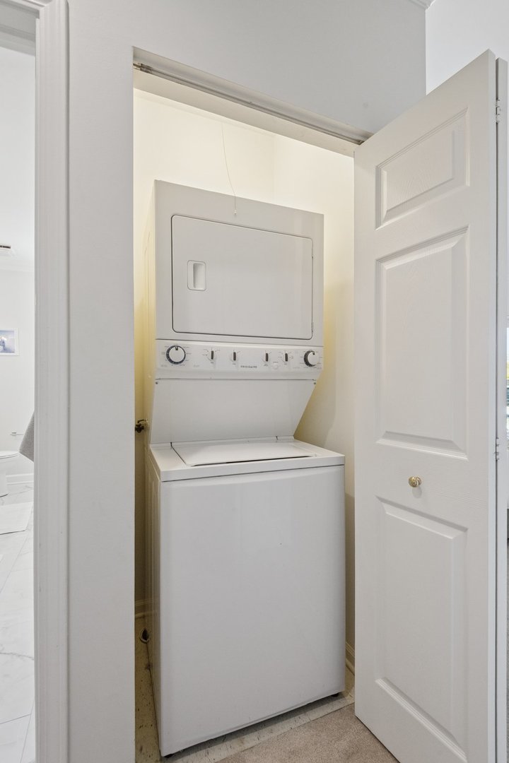 1122 West Armitage Avenue, Unit 302 Chicago, IL 60614 - Photo 21 of 23 a utility room with dryer and washer