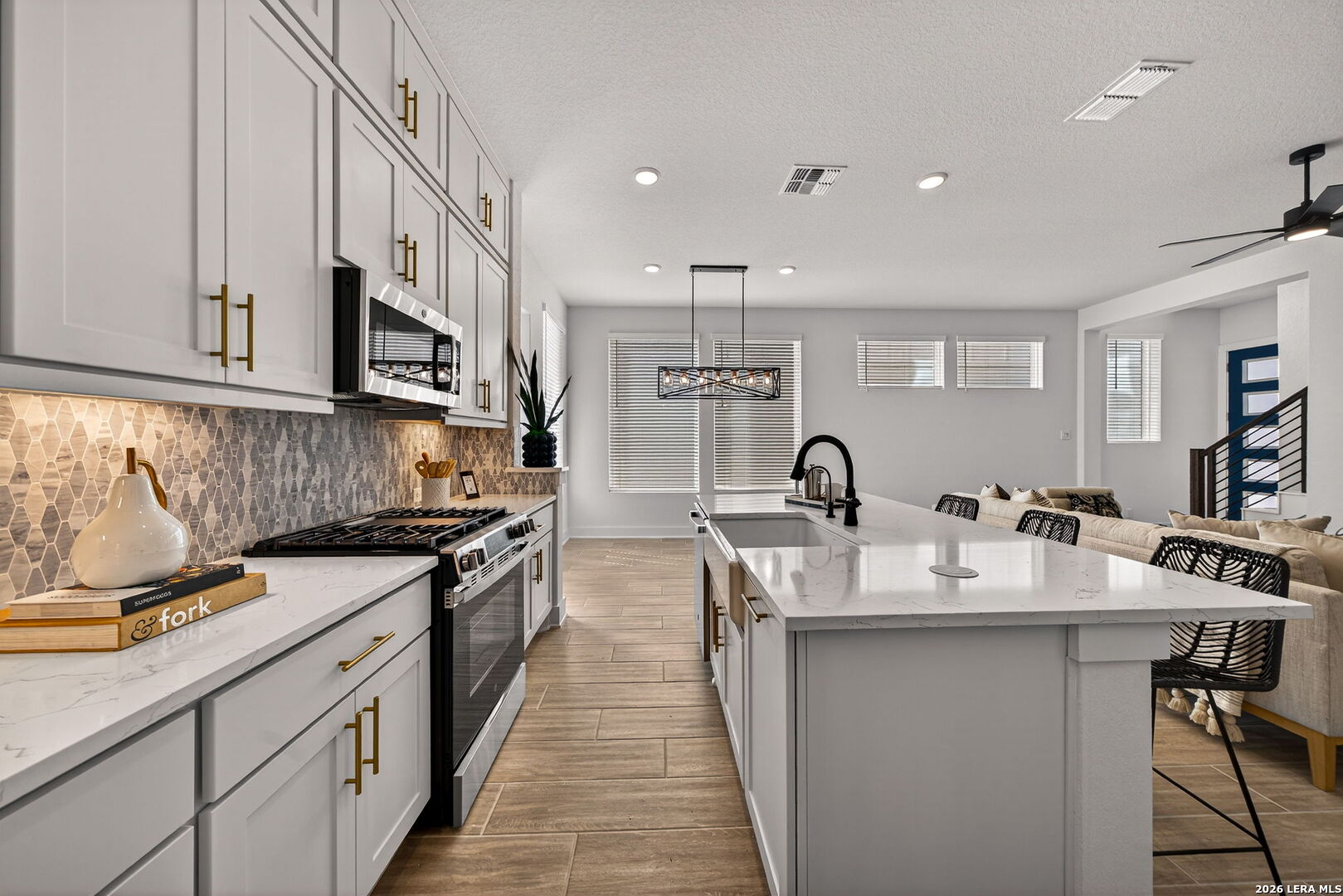 20675 Huebner Road, Unit 527 San Antonio, TX 78258 - Photo 13 of 33 a kitchen with counter top space a sink and appliances