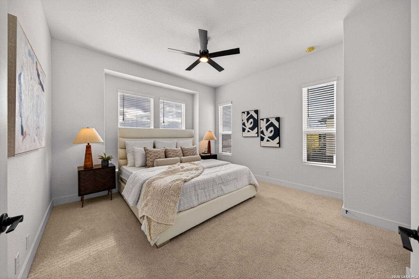 20675 Huebner Road, Unit 527 San Antonio, TX 78258 - Photo 19 of 33 a bedroom with bed and a window