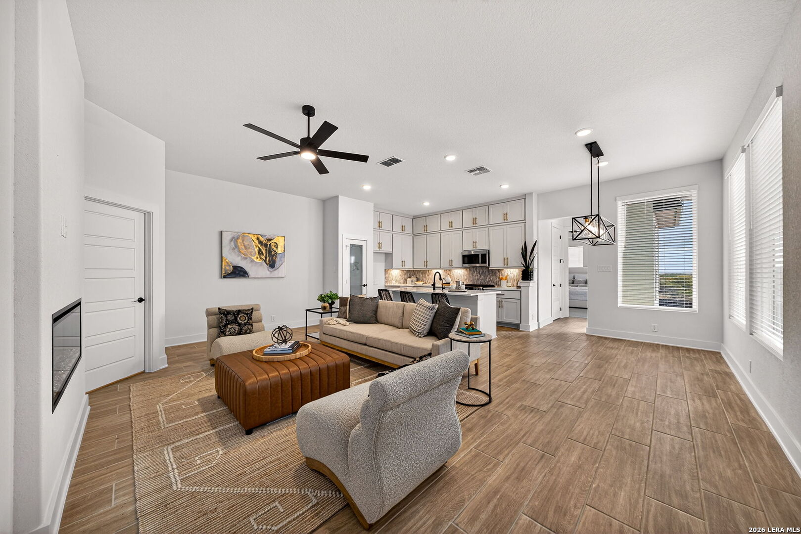 20675 Huebner Road, Unit 527 San Antonio, TX 78258 - Photo 6 of 33 a living room with furniture kitchen and a window