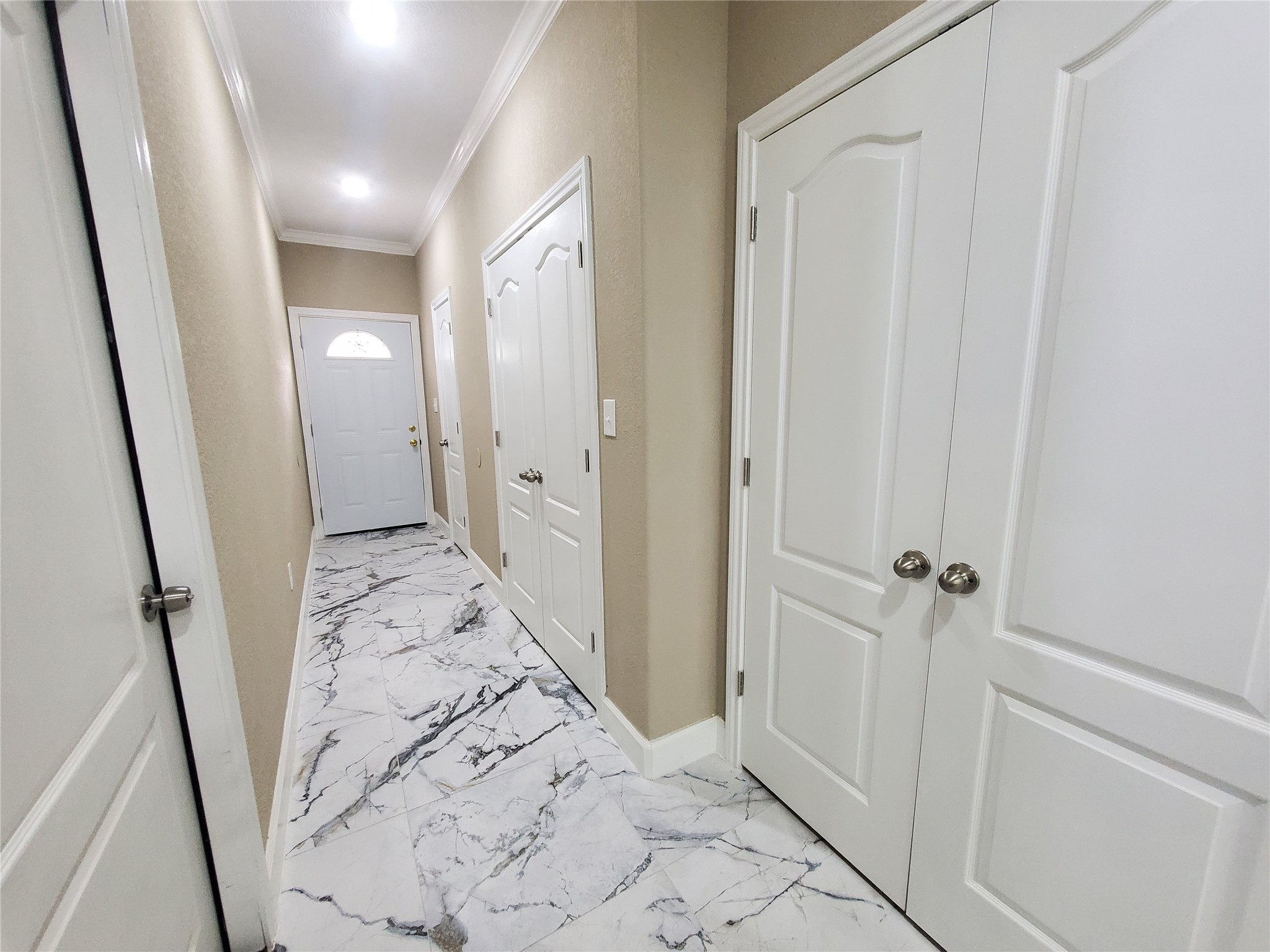 1306 North 9th Street Conroe, TX 77301 - Photo 24 of 47 a view of a bathroom from a hallway
