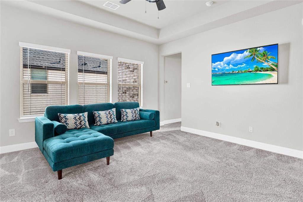 616 Windy Ridge Lane Rockwall, TX 75087 - Photo 14 of 25 a living room with furniture and a window