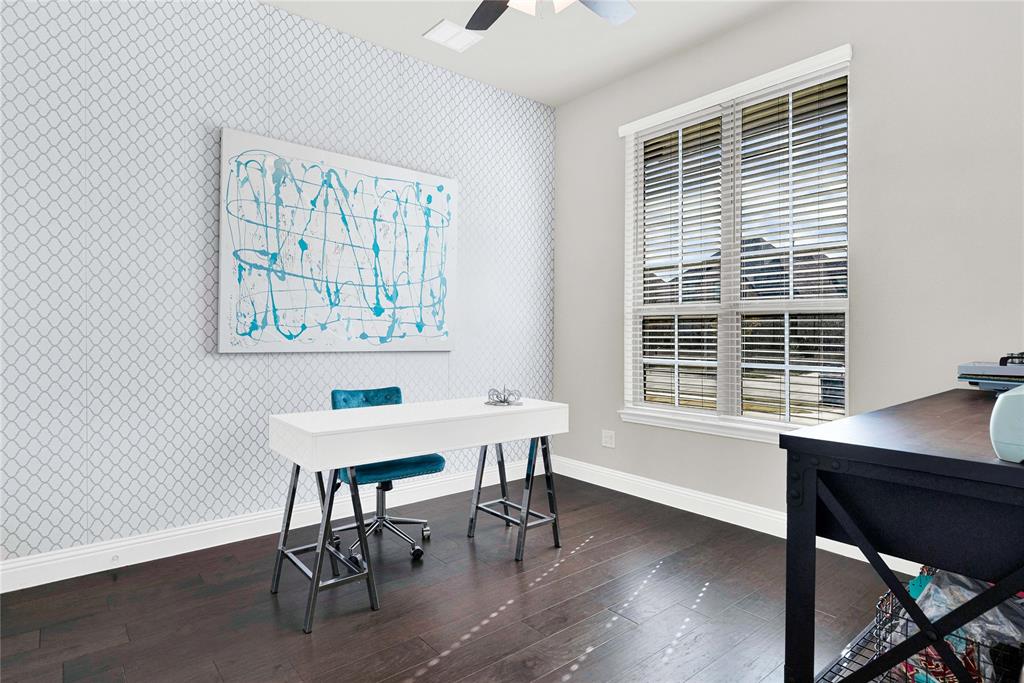 616 Windy Ridge Lane Rockwall, TX 75087 - Photo 5 of 25 a view of a workspace with furniture and a window