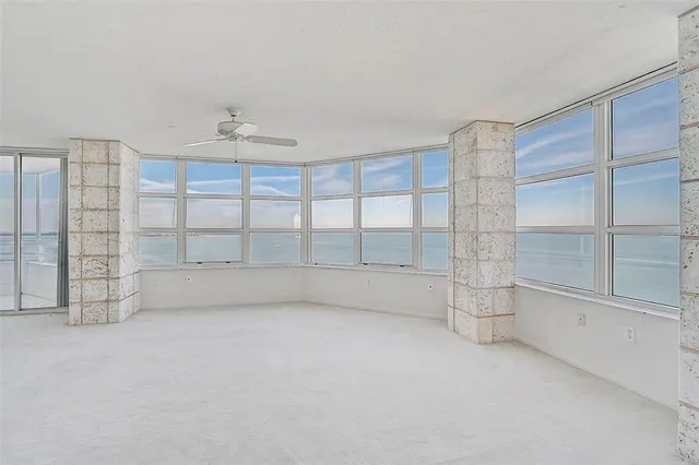a bathroom with a double vanity sink mirror and shower