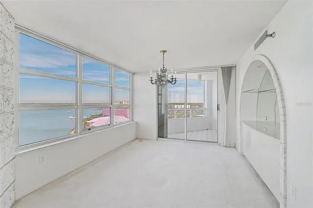 a bathroom with a shower and a sink