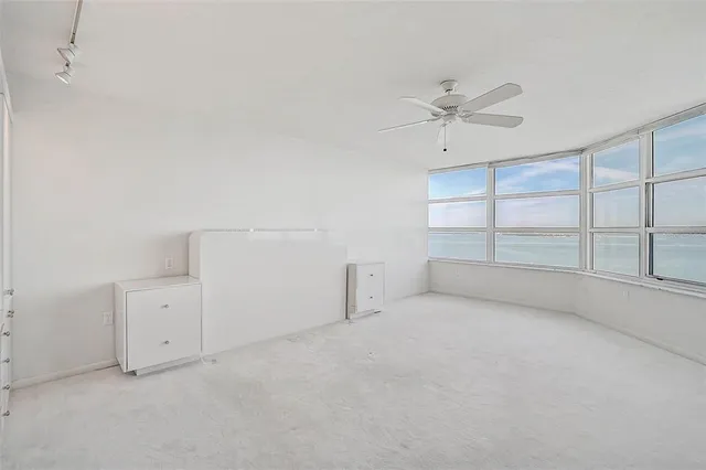a view of kitchen with an empty space and window