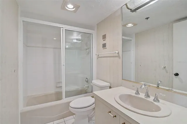 a view of a swimming pool with a lounge chair